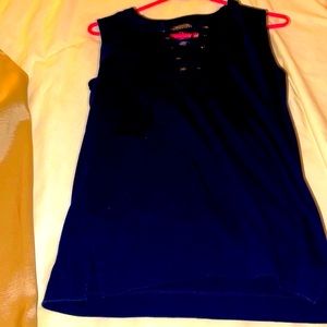 Black sleeveless top with laces on front neckline